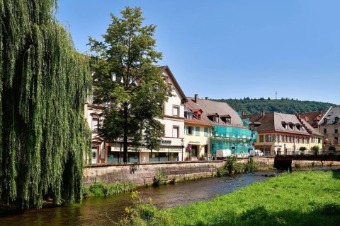 Ettlingen, Germany - August 13th 2025: Alb brook in historic center of Ettlingen, Germany. Small