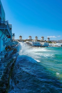 Mykonos, Cyclades, Greece - The six sixteenth-century windmills, lined up on a hill above Mykonos