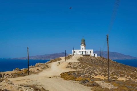 Mykonos, Cyclades, Greece - The Armenistis lighthouse in the north of the island is a landmark and