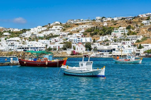 Mykonos, Cyclades, Greece - fishing boats are moored in the old port of Mykonos Town, Mykonos Chora