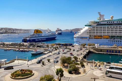Mykonos, Cyclades, Greece - Mykonos New Port, a Blue Star Ferries ferry and a cruise ship are