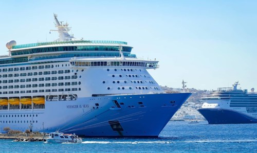 Mykonos, Cyclades, Greece - Voyager of the Seas cruise ship is located in Mykonos New Port. In the