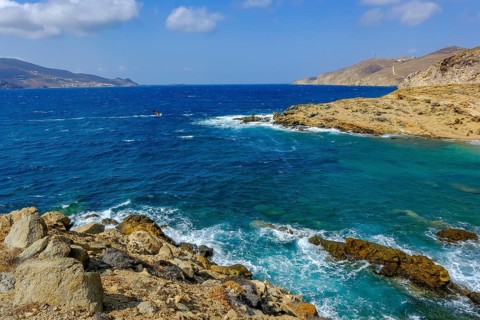 Mykonos, Cyclades, Greece - Ftelia Beach, Ftelia Beach, sandy beach on a windy rocky coast in the