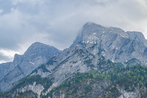 View into the mountains next to Lake Traunsee on a rainy day in spring, Traunstein summit,