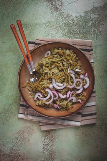 Jonjoli, Colchian klekachka, jonjoli salad, with red onion and butter, Georgian appetizer, pickled