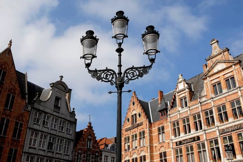 Street lamp in front of historic building view, Market Square, Bruges, UNESCO World Heritage Site,