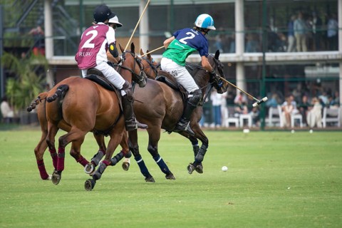 Adolfo Cambiaso known as Poroto from Team Natividad Dolfina hits the ball in the game against Zeta