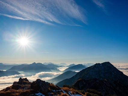 Blue-colored silhouette of mountains, fog in the valley, Hochstaufen, Chiemgau Alps, Upper Bavaria,