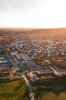 Autumn city view at sunset with roads and numerous buildings, Großbottwar, Germany