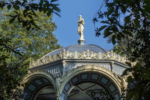 Greek Muze Erato, goddess Nike, griffins and palmettes decorating 1885 Kiosk, music pavillion at
