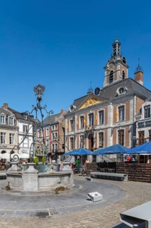 Li Bassinia, 15th century fountain and 18th century town hall at the Grand Place in the city Huy in