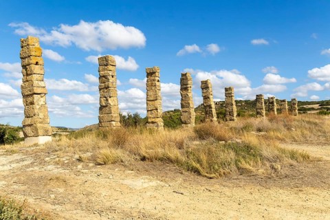 Stone columns of ancient aqueduct, Roman site of Los Banales, near Layana, Zaragoza province,