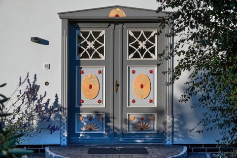 Artistically designed front door of a residential building, Ahrenshoop, Darß, Mecklenburg-Western