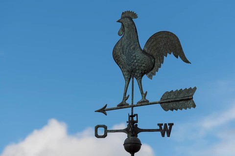 Weather vane against clear blue sky, peaceful atmosphere, Baden-Württemberg, Germany