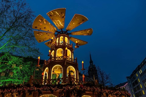Christmas market with three-story illuminated Christmas pyramid, Rindermarkt, Munich, Upper