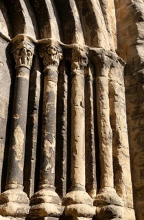 Stonework religious carvings, Iglesia del Salvador church, village of Luesia, Cinco Villas,