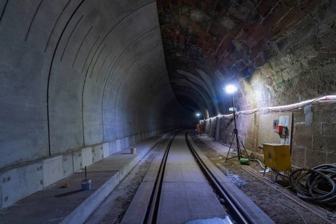 Tunnel with illuminated rails, cabling and modern technology, built by Hermann, Hesse, Bahn, Calw,