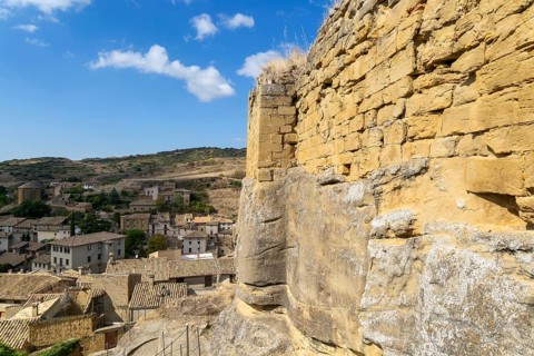 Castle walls built on rock outcrop, medieval village of Uncastillo, Cinco Villas, Zaragoza