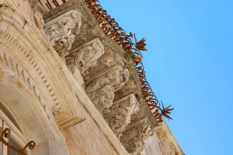 Baroque balcony, Palazzo Cosentini, Ragusa Ibla, Ragusa province, Sicily, Italy