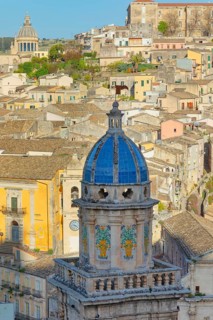 Elevated view of the church of Santa Maria dell'Itria and Ragusa Ibla in the distance, Ragusa Ibla,