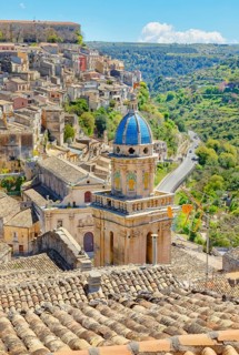 Elevated view of the church of Santa Maria dell'Itria and Ragusa Ibla in the distance, Ragusa Ibla,