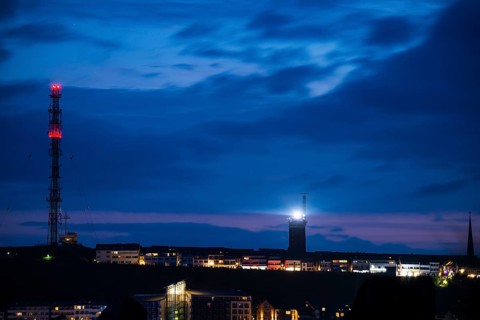 View of the highlands of the island of Heligoland at night with red-lit radio tower, radio tower,