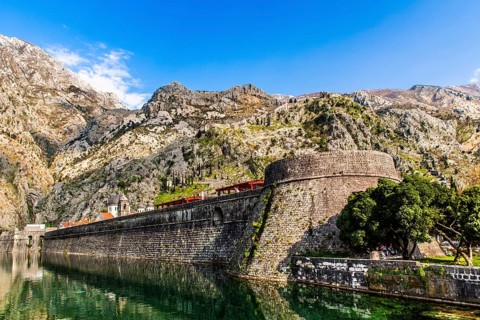 Fortress wall to the North Gate, medieval town of Kotor with winding alleys, rich in historical