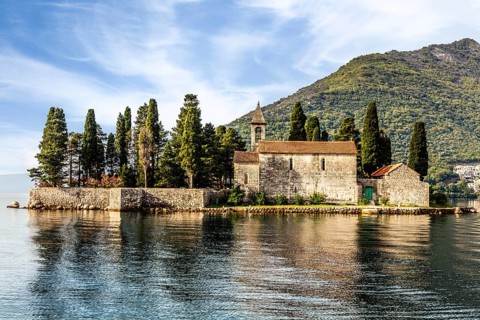 Former Perast seafaring center with the interesting offshore island of Sveti Dorde - St. Georg, in