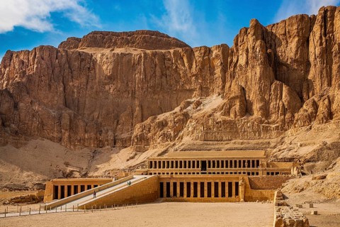 Mortuary temple of Pharaoh Hatshepsut - Deir el-Bahari, behind the rock face lies the Valley of the