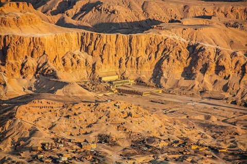 Mortuary temple of Pharaoh Hatshepsut - Deir el-Bahari, behind the rock face lies the Valley of the