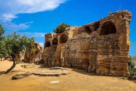 City wall with arcosol tombs, Valley of the Temples, Agrigento, Sicily, Italy