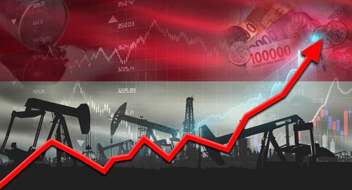 Growth of oil industry with Indonesian flag. Oil pumps with Indonesian flag. Oil production with