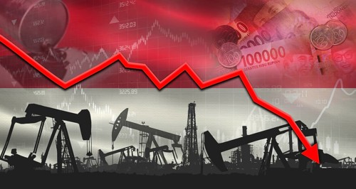 Fall oil price with Indonesian flag on economic chart, Petrol crisis with Indonesian flag on