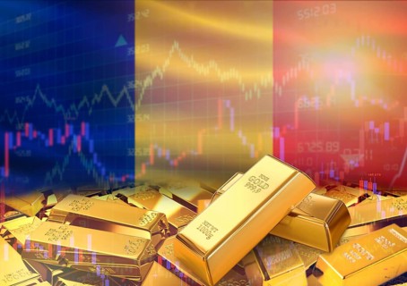 Gold bars on Romania flag in background. Gold bars stacked on Romanian flag. Concept of Romania
