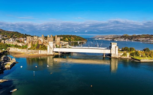 Conwy Castle over River Convy from a drone, Convy, North Wales, England, United Kingdom