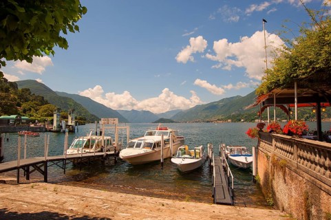 Bellagio, picturesque small town with views of the Alps, boats on Lake Como, Italian Lago di Como,