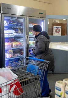 Detroit, Michigan USA - 4 November 2025 - People pick up groceries at the nonprofit Deo Gratias