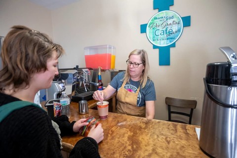 Detroit, Michigan USA - 4 November 2025 - A volunteer makes coffee for a client at the nonprofit