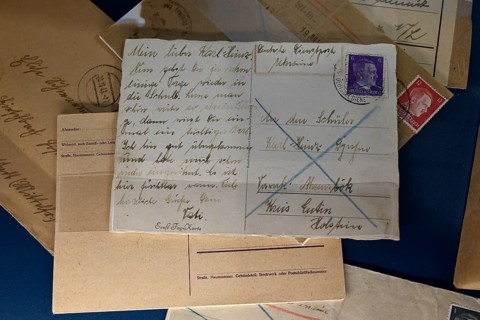 Postcard in the exhibition Destiny Herrenmensch in the former NS Ordensburg Vogelsang, interior