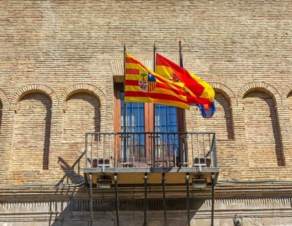 Flags flying on Palacio de los Condes de Morata o de Luna, Zaragoza, Aragon, Spain, Europe now