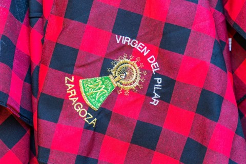 Traditional red chequered scarf worn during fiesta Virgen del Pilar Zaragoza, Aragon, Spain