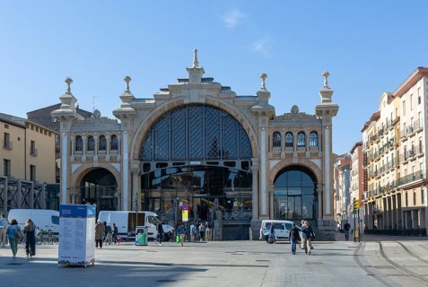 People vehicles street by central market building, Mercado Central de Zaragoza, Zaragoza, Aragon,