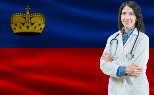 Liechtensteiner medicine and healthcare concept. Doctor close up against Liechtenstein flag