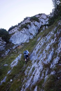 Hikers at the Iron Ladder on the way to Rettenkogel, Postalm, Osterhorn Group, Salzkammergut,
