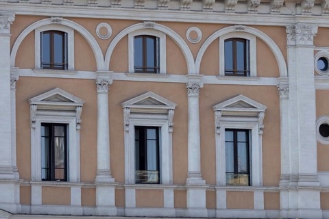 Windows of a building in the city of Rome, Italy