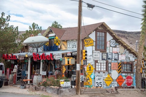 Goldfield, Nevada - An old house covered by road signs