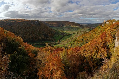 Panoramic picture of golden autumn in the Swabian Jura with colorful leaves and Reussenstein castle