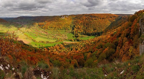 Panoramic picture of Indian Summer on the Swabian Jura in the Nenninger Valley with Reussenstein