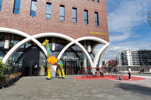 Westfield, shopping center, giraffe sculpture, artwork, mascot of the LEGO Discovery Centre on the