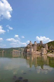 Golubac Fortress or Kolumbatz or Pigeon Town or Pigeon Castle on the Danube, in the background the
